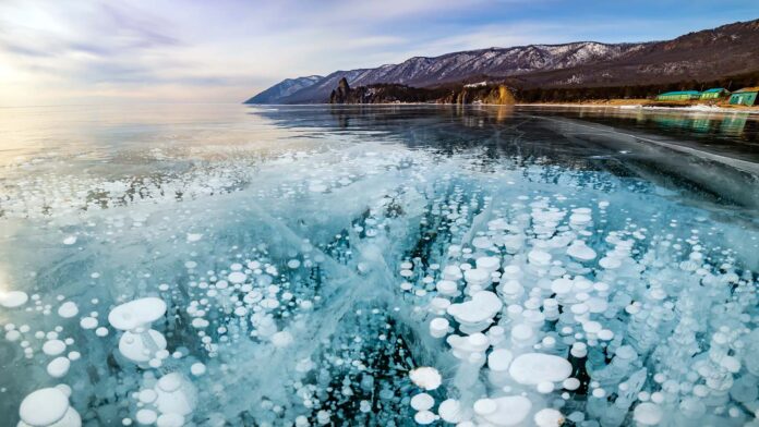 Bubbles in the ice on Lake Baikal in winter. Siberia, Russia